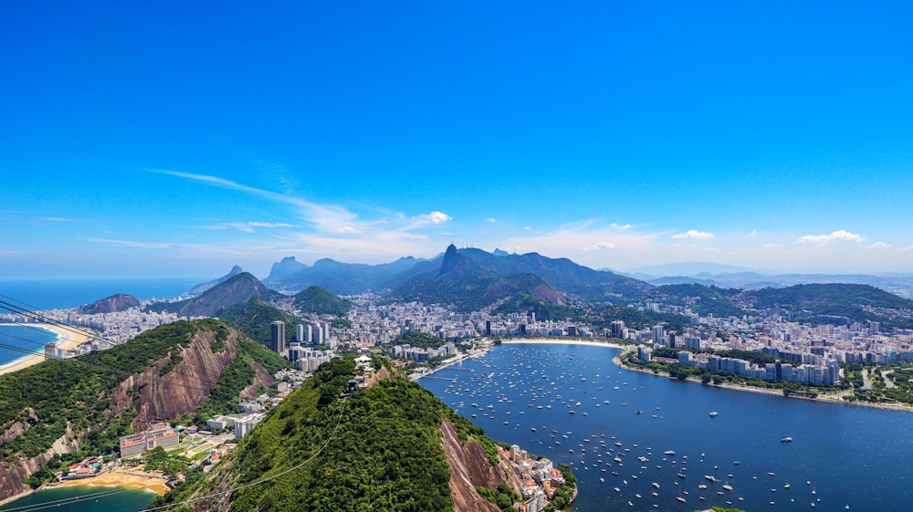 a scenic view of a city and a body of water