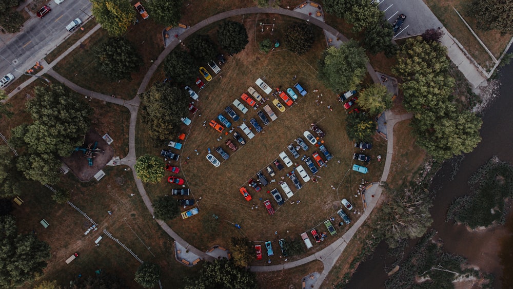 a circle of parked cars in a parking lot