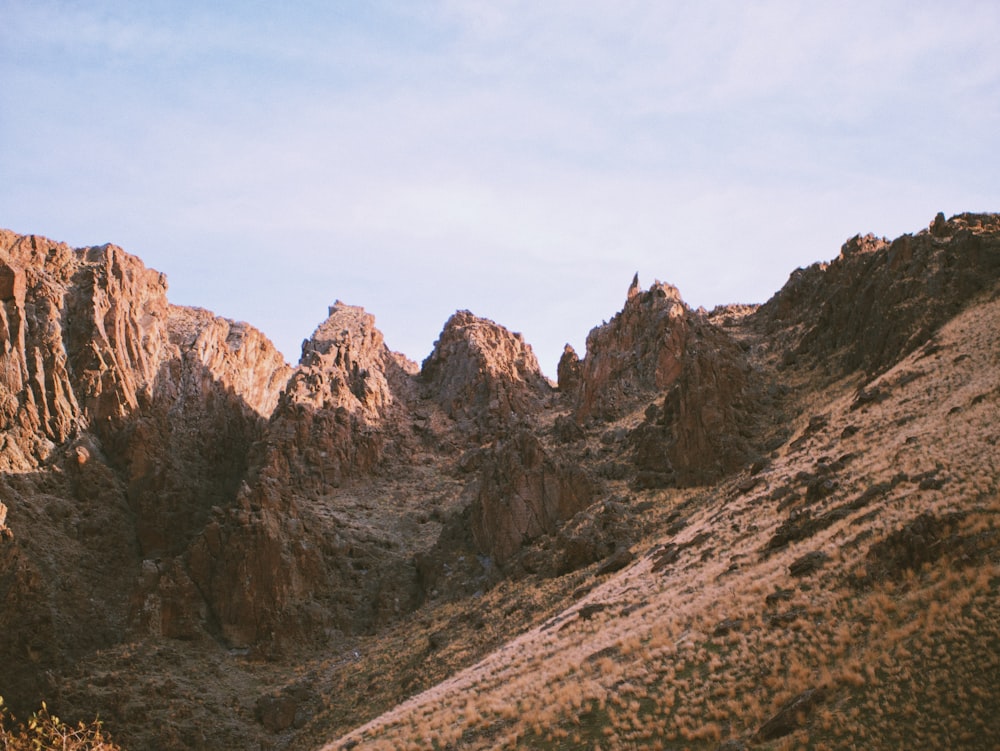 a view of a mountain range with a sky background