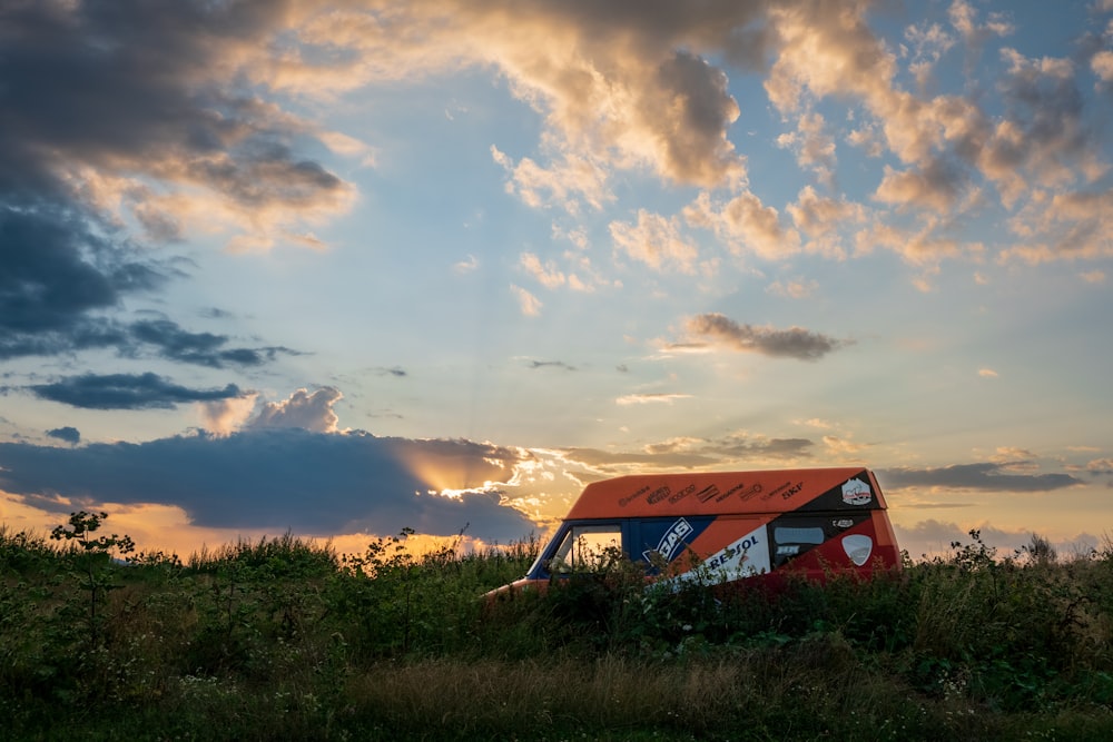 a bus that is sitting in the grass