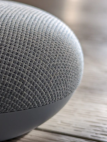 Macro shot of a wearable device edge lifting slightly, highlighting common adhesion challenges.