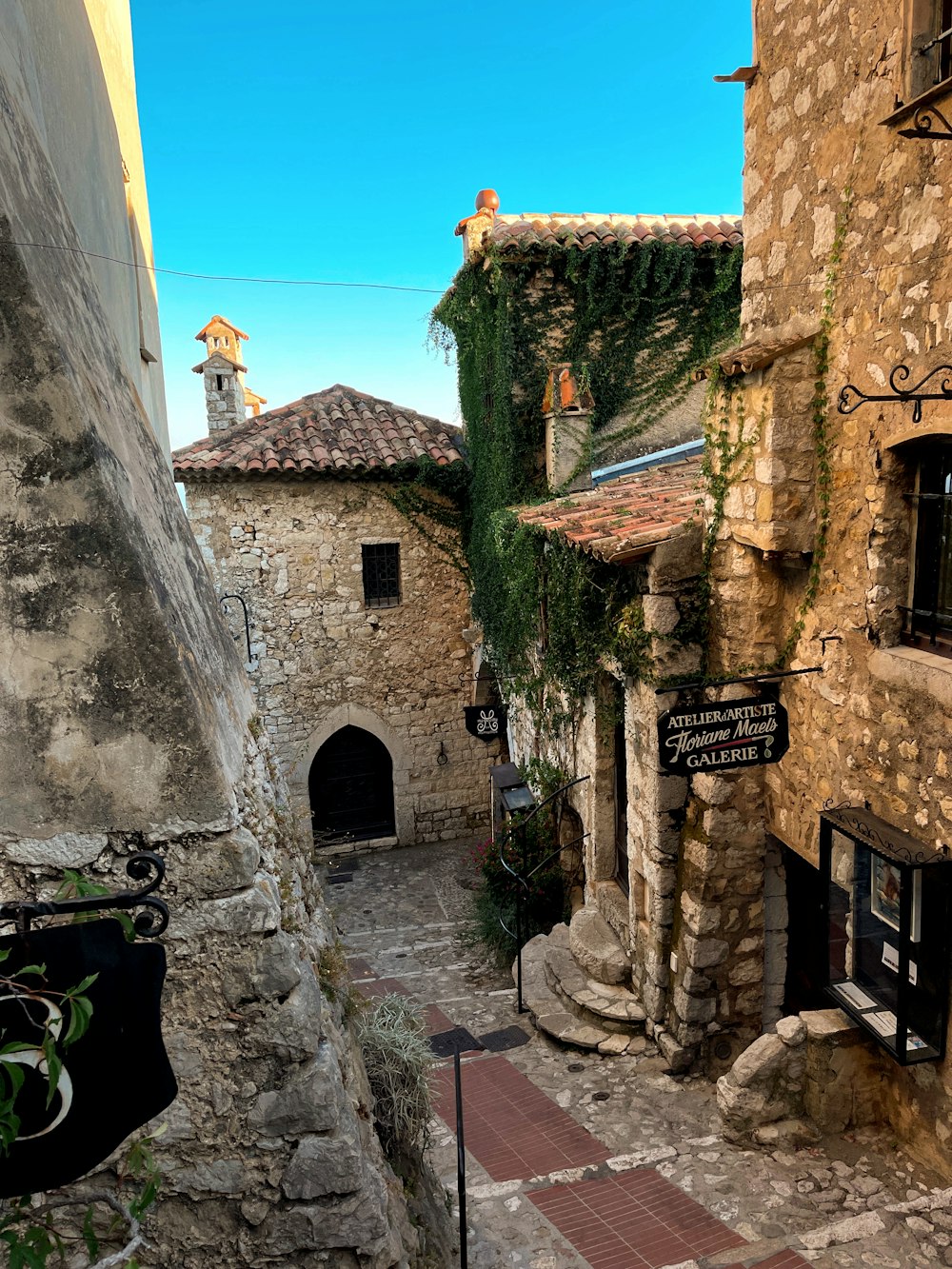 a stone building with a clock tower on top of it