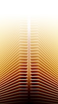 a yellow and orange background with wavy lines