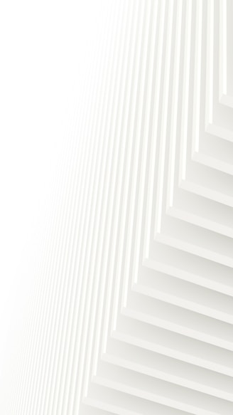 an abstract white background with vertical lines