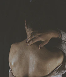 a woman with a ring on her neck