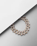Model wearing the x chain necklace against a crisp white background, highlighting its minimal elegance.
