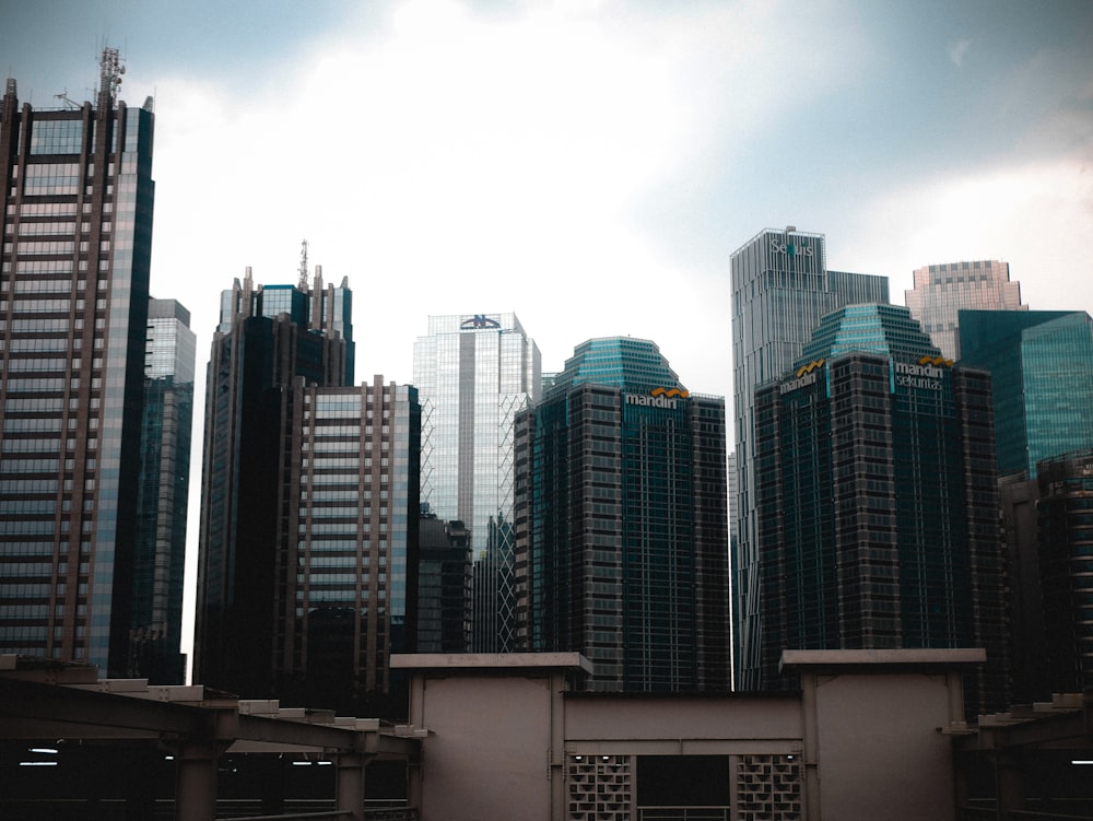 a group of tall buildings in a city