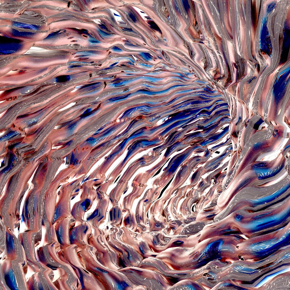 a close up view of a colorful swirl