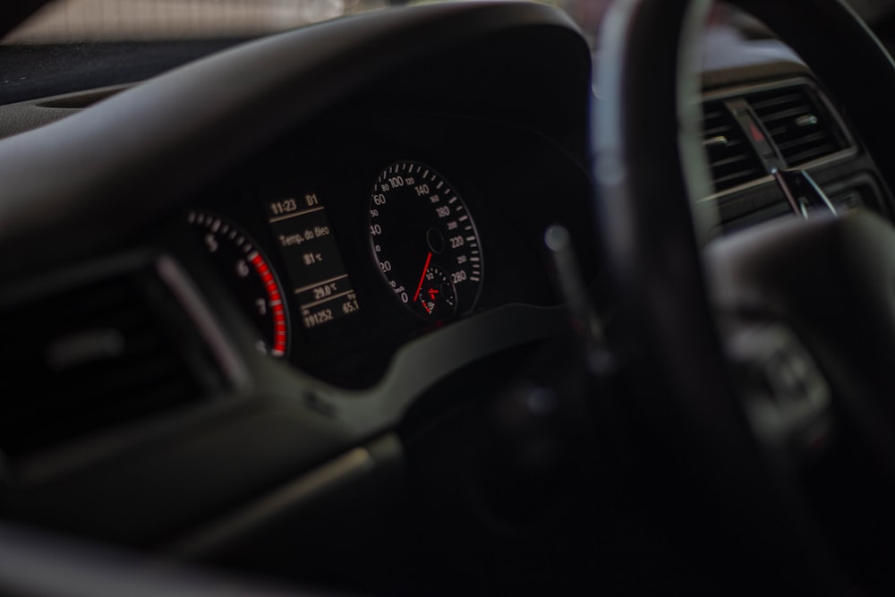 the dashboard of a car with a speedometer