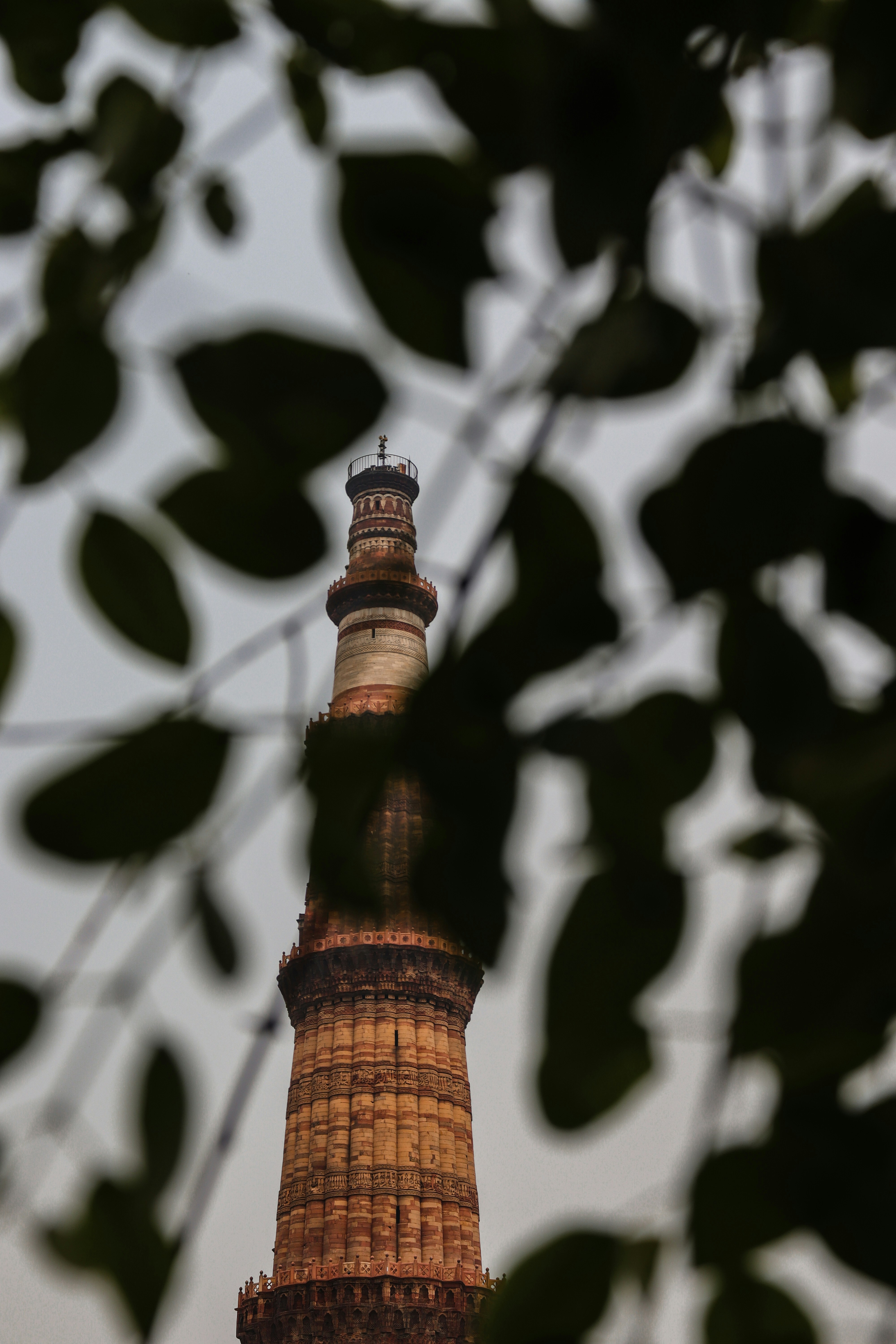 a tall tower with a clock on top of it