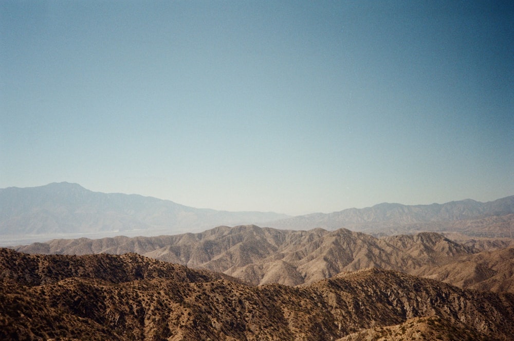 a view of a mountain range in the desert