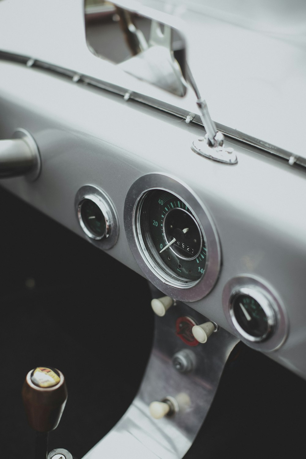 a close up of a car dashboard with a speedometer