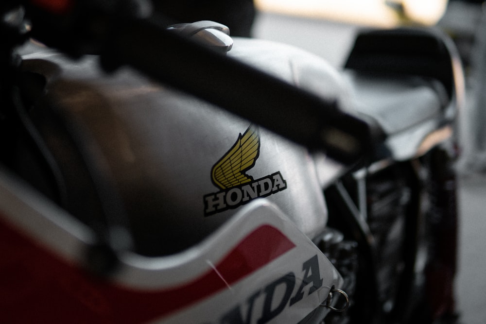 a close up of a motorcycle parked on a street