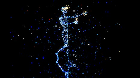 a person standing in the air with a star in their hand