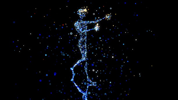 a person standing in the air with a star in their hand