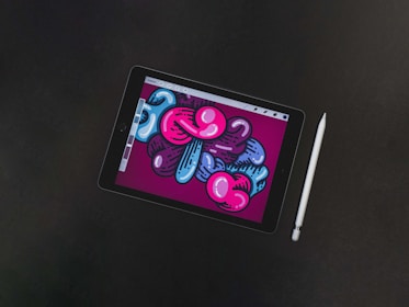 a tablet with a drawing on the screen