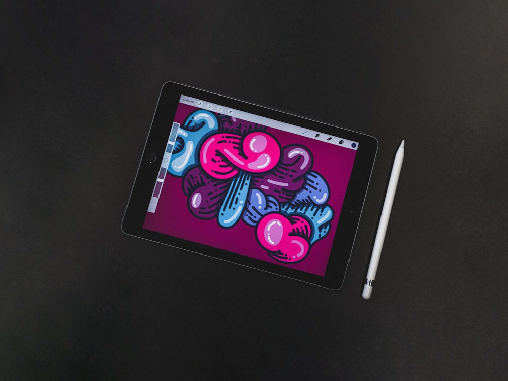 a tablet with a drawing on the screen
