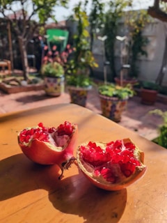Close-up of jujube seeds arranged artistically on a wooden surface with soft natural light.