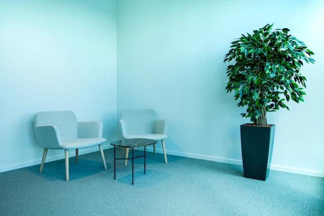 Soft Teal Waiting Bay — commercial reception interior design