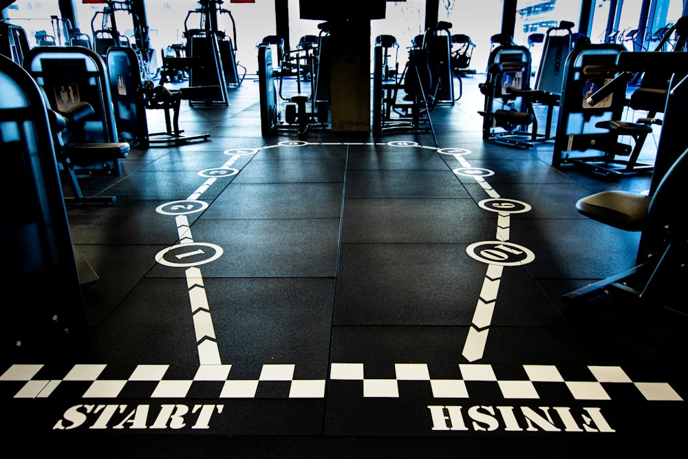 a gym floor with a checkered pattern on it