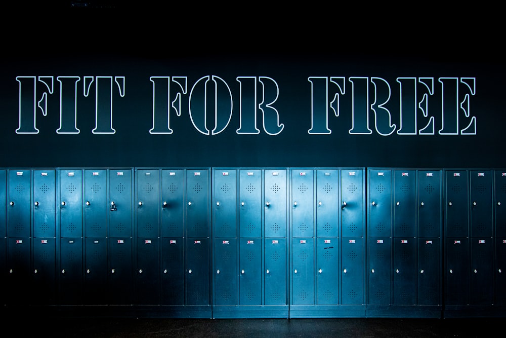 a row of lockers with the words fit for free written on them