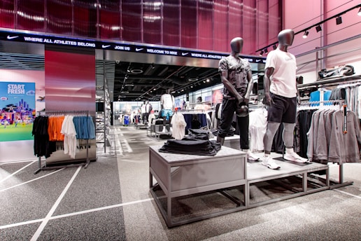 a couple of mannequins that are standing in a store