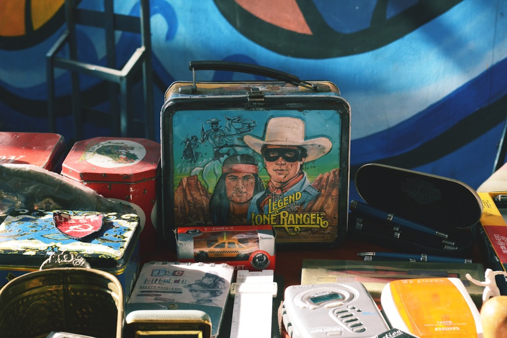 a suitcase with a picture of two men on it