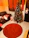A cozy living room decorated for a private Santa visit, with delighted children gathered around.