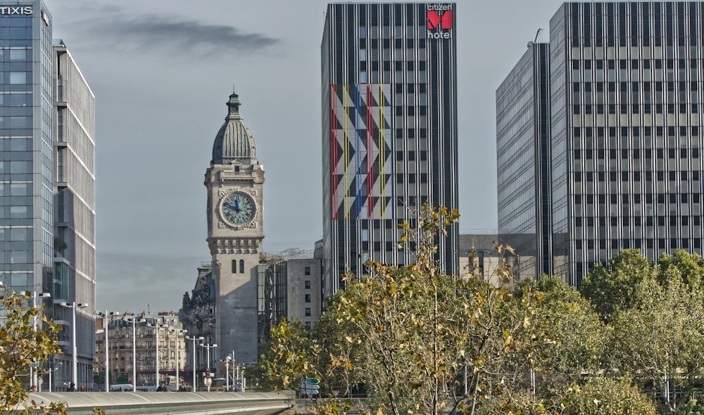 a large clock tower towering over a city