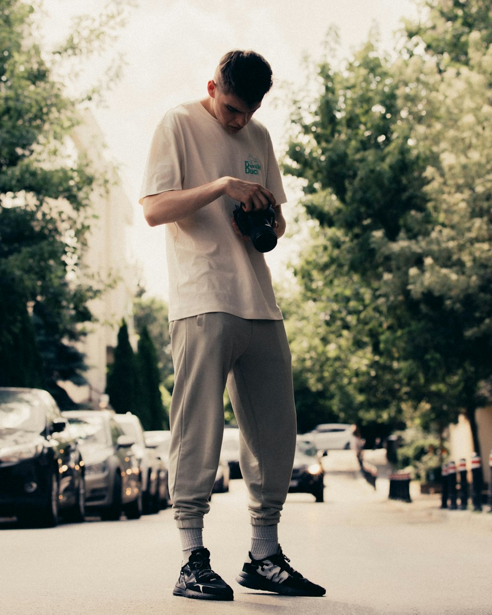 a man riding a skateboard down a street