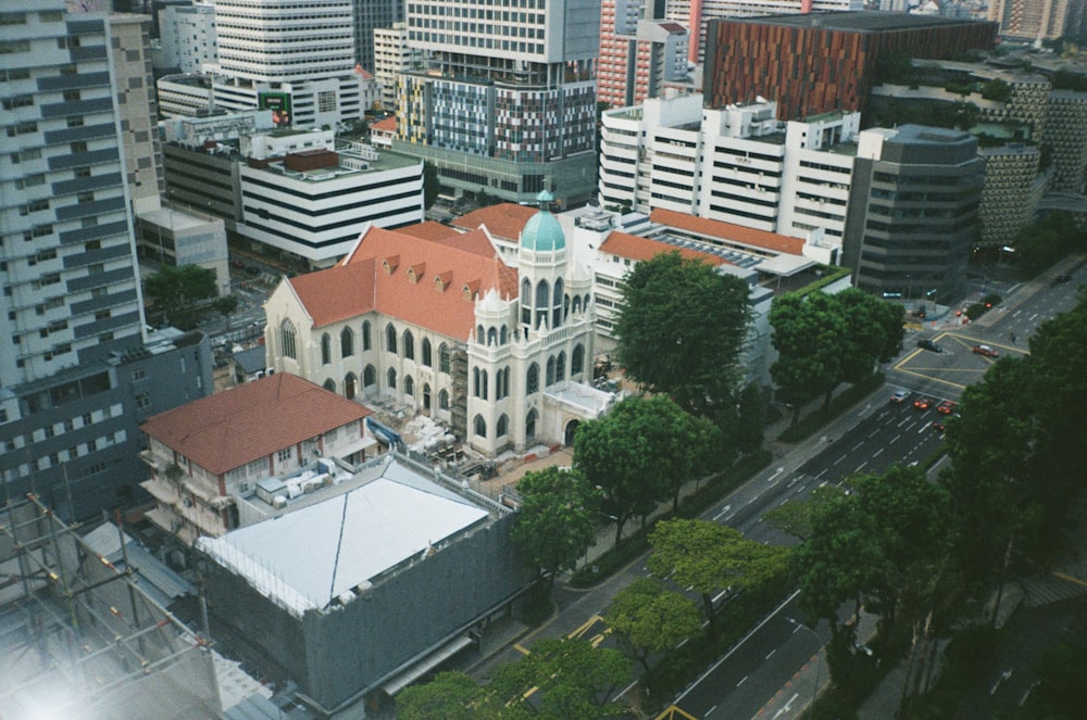 an aerial view of a city with tall buildings