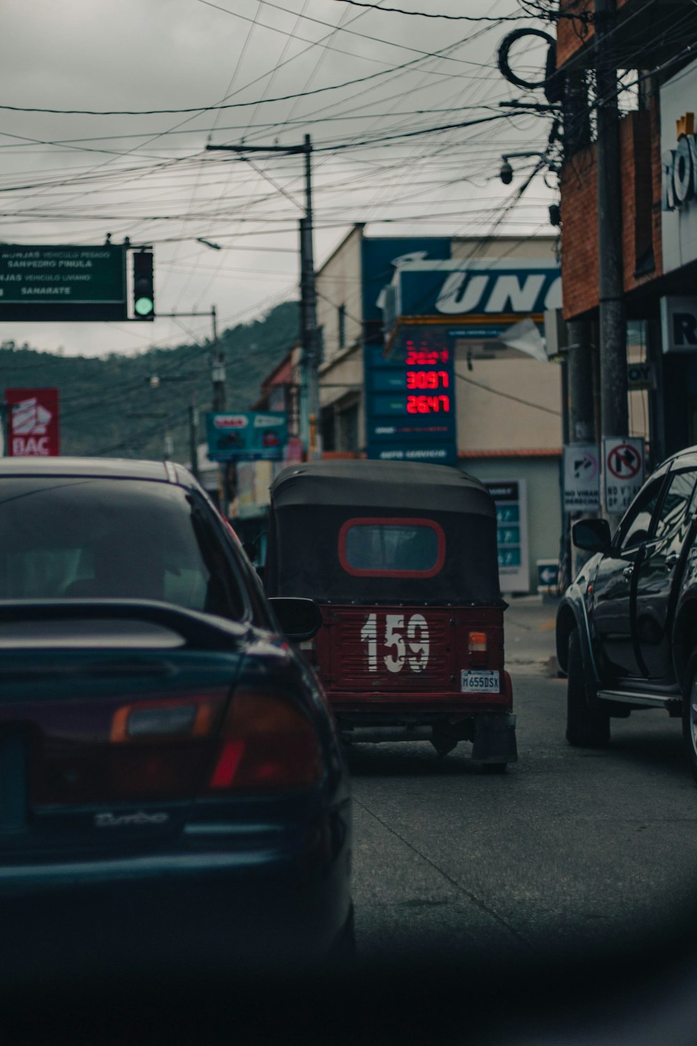 a city street filled with lots of traffic