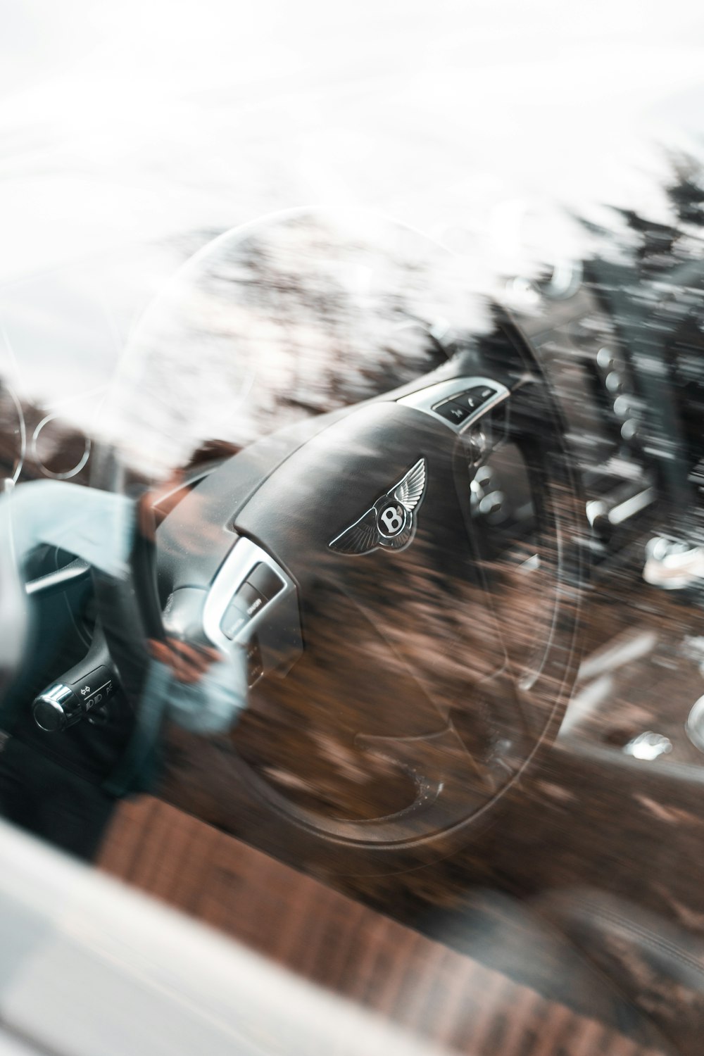 a blurry photo of a motorcycle in a car