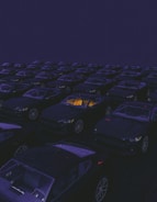 a parking lot filled with lots of parked cars