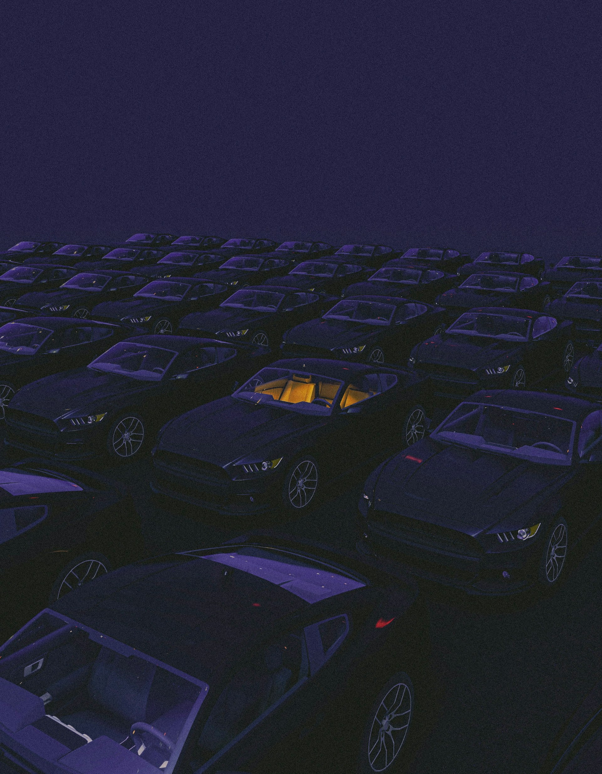 a parking lot filled with lots of parked cars