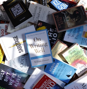 a pile of books sitting next to each other