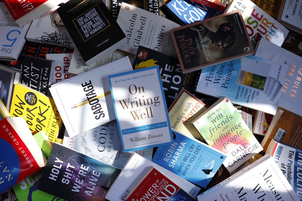 a pile of books sitting next to each other