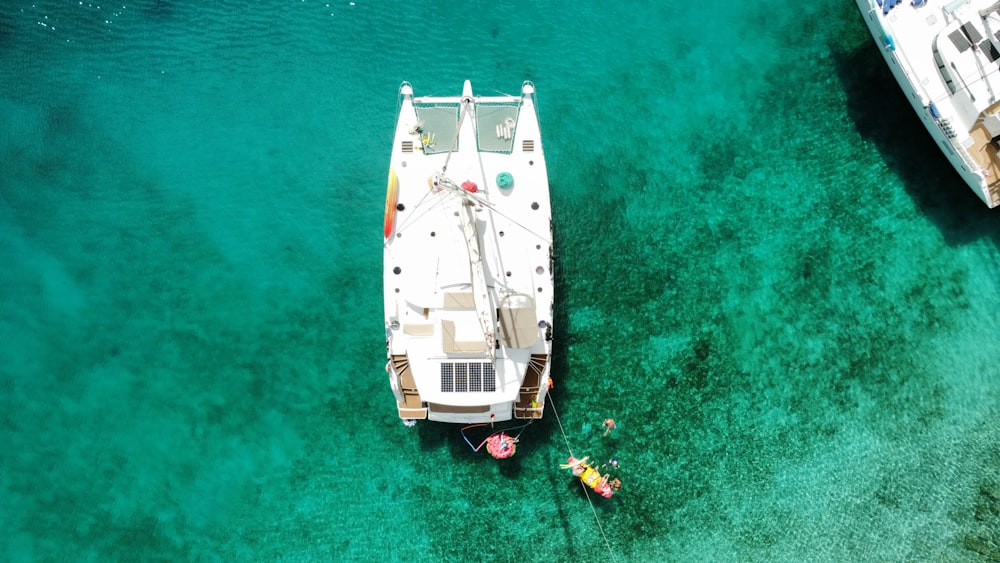 a boat floating on top of a body of water