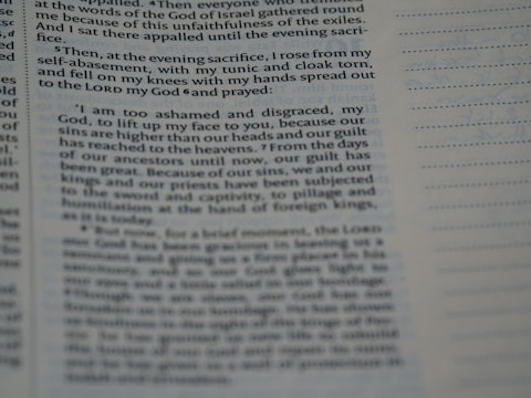 A close-up view of a page from a book, highlighting a section of text. The left side contains paragraphs with a large margin, and lines of text extend to the middle of the page. The right side is mostly blank except for a series of evenly spaced horizontal lines.