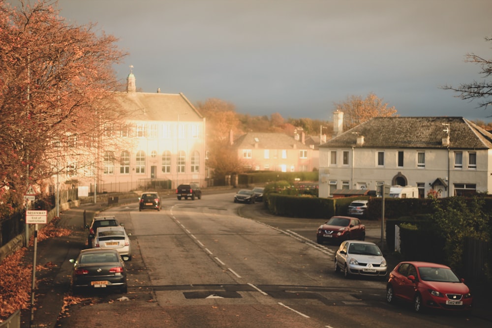 a street with cars parked on both sides of it