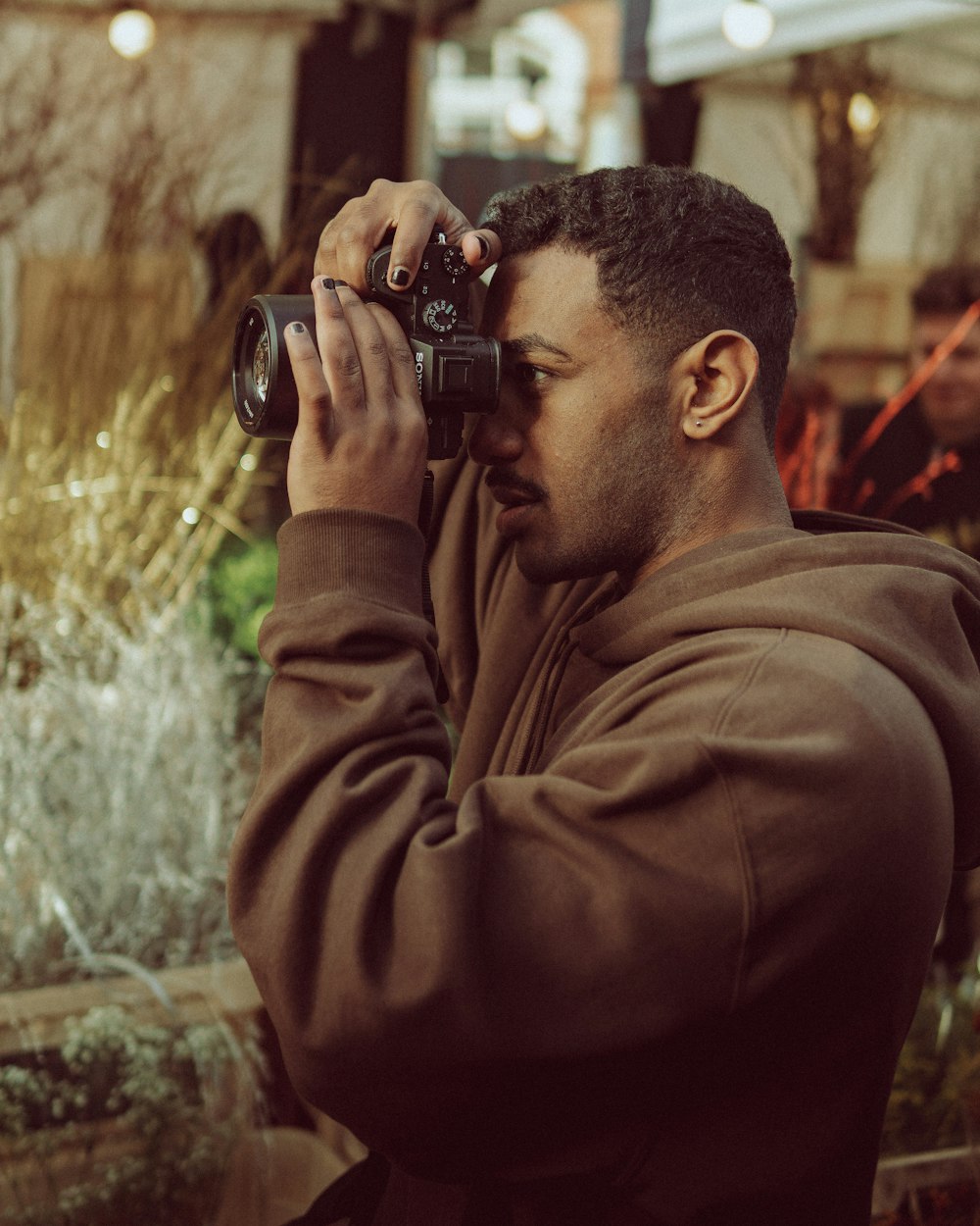 a man taking a picture with a camera