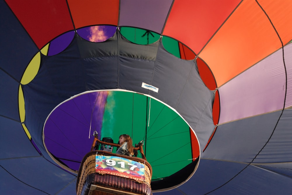 a large colorful hot air balloon being inflated