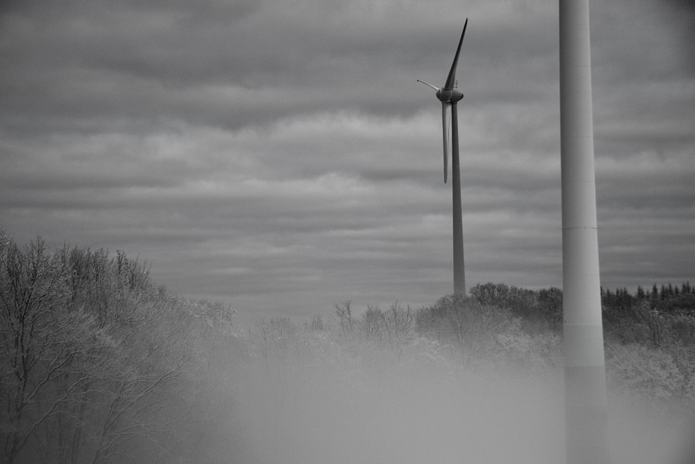 black and white photo of a wind turbine