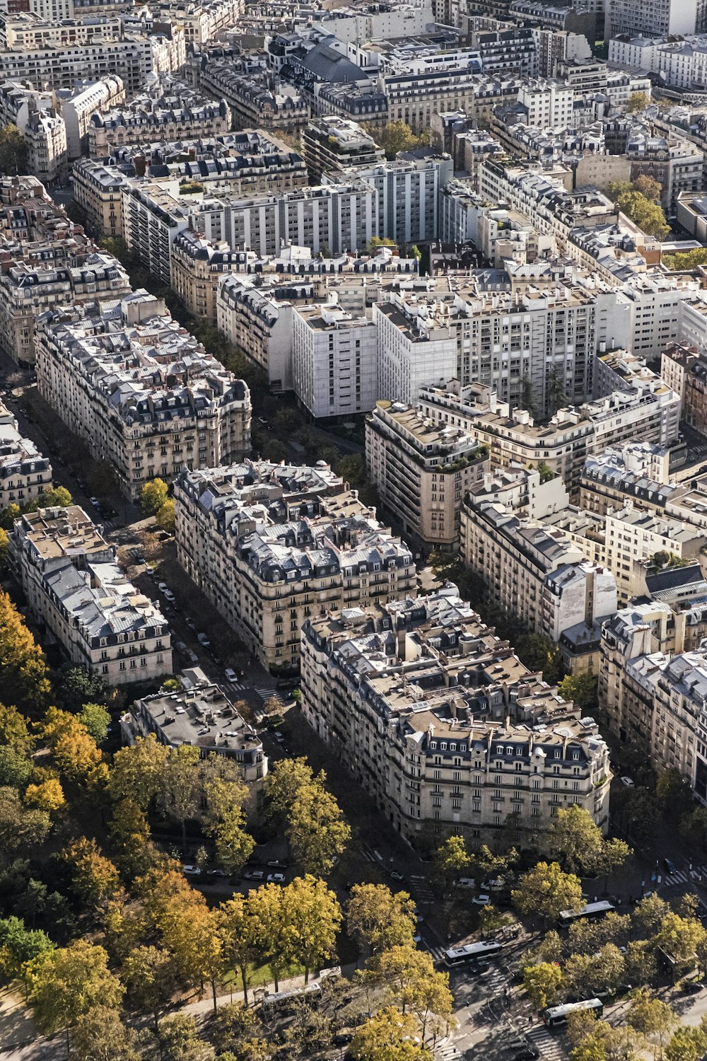 an aerial view of a city with lots of tall buildings