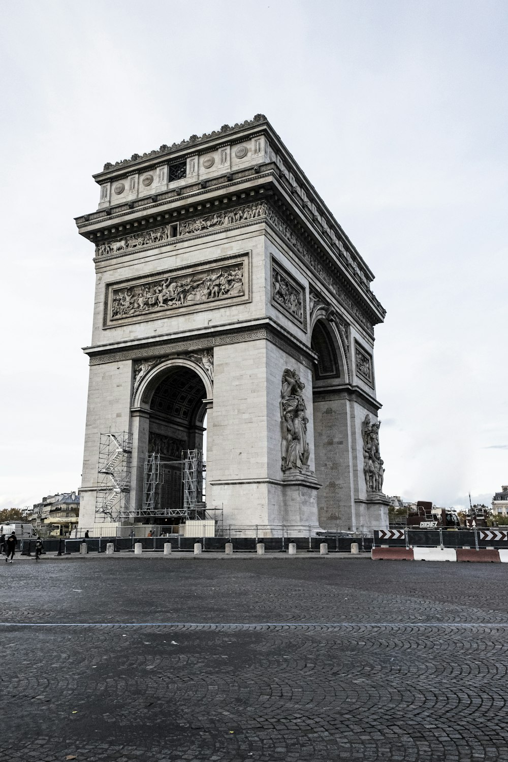 a very tall monument with a clock on it's side