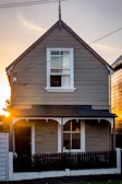 Front view of the 1914 Craftsman bungalow showing original woodwork and fresh paint.