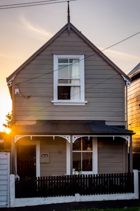 Front view of the 1914 Craftsman bungalow showing original woodwork and fresh paint.