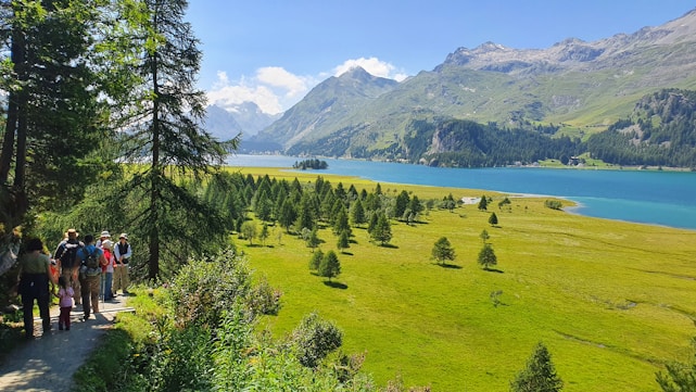 Scenic mountain landscape with travelers enjoying a peaceful hike