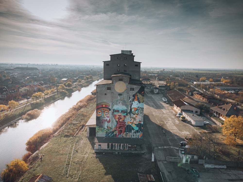an aerial view of a building with a mural on it