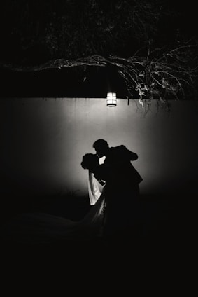 A serene setting with a couple enjoying a moment of intimacy, symbolizing connection and confidence.